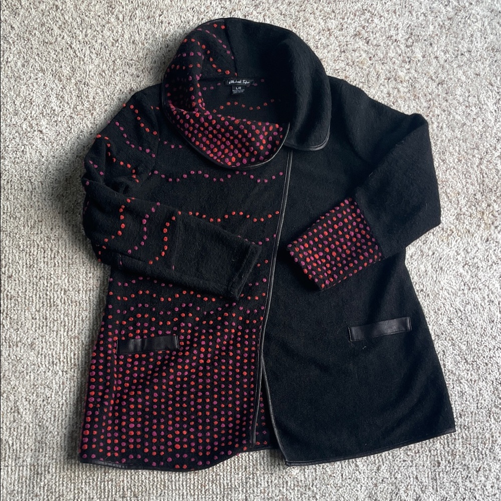 Michael Tyler sweater with purple and red detail.